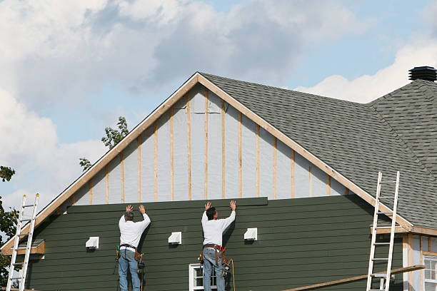 Professional Siding Contractor technician working in Rural Valley, PA